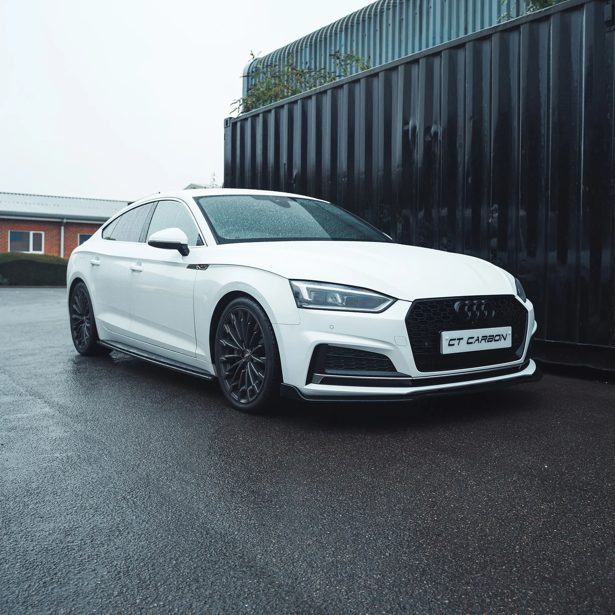 AUDI A5/S5 B9 2016-2019 GLOSS BLACK SPLITTER-Splitter-BLAK BY CT-CT Carbon - High-quality carbon fiber and gloss black aerodynamic parts for premium sports and luxury vehicles.