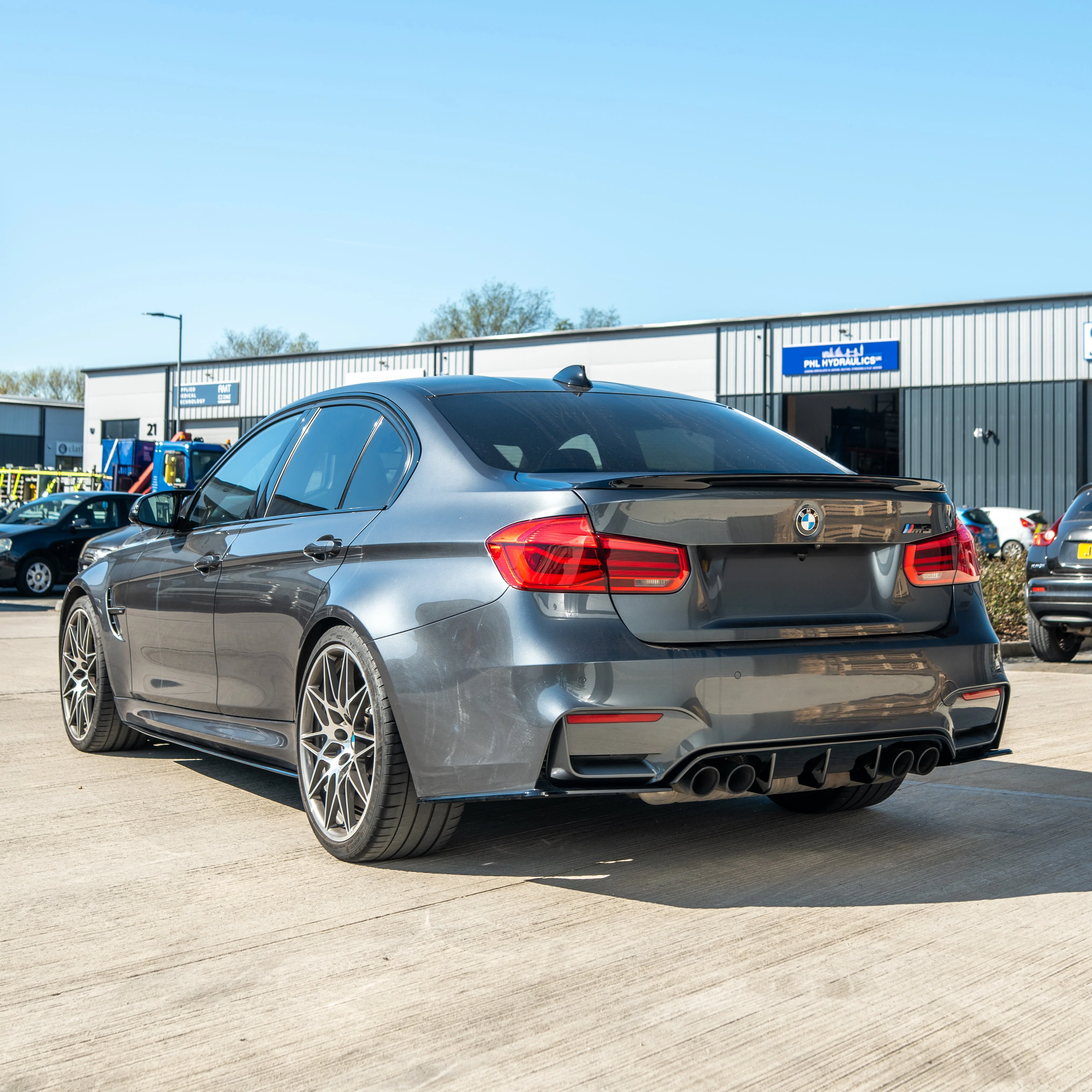 BMW M3/M4 (F80 F82 F83) GLOSS BLACK DIFFUSER - V STYLE-Diffuser-BLAK BY CT-CT Carbon - High-quality carbon fiber and gloss black aerodynamic parts for premium sports and luxury vehicles.