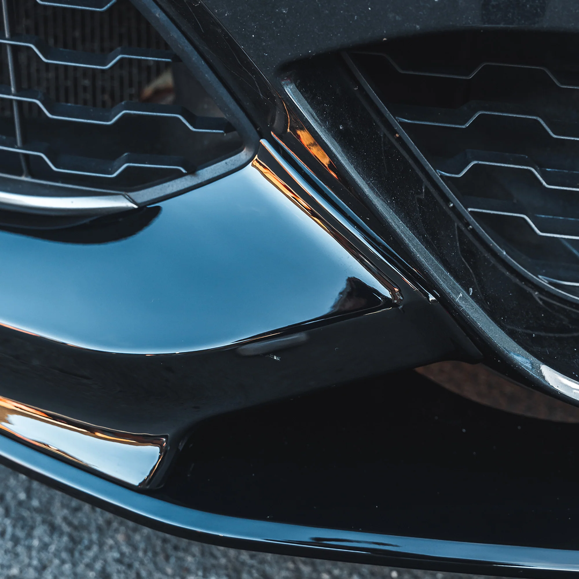 BMW F20/F21 1 SERIES LCI GLOSS BLACK SPLITTER-Splitter-BLAK BY CT-CT Carbon - High-quality carbon fiber and gloss black aerodynamic parts for premium sports and luxury vehicles.