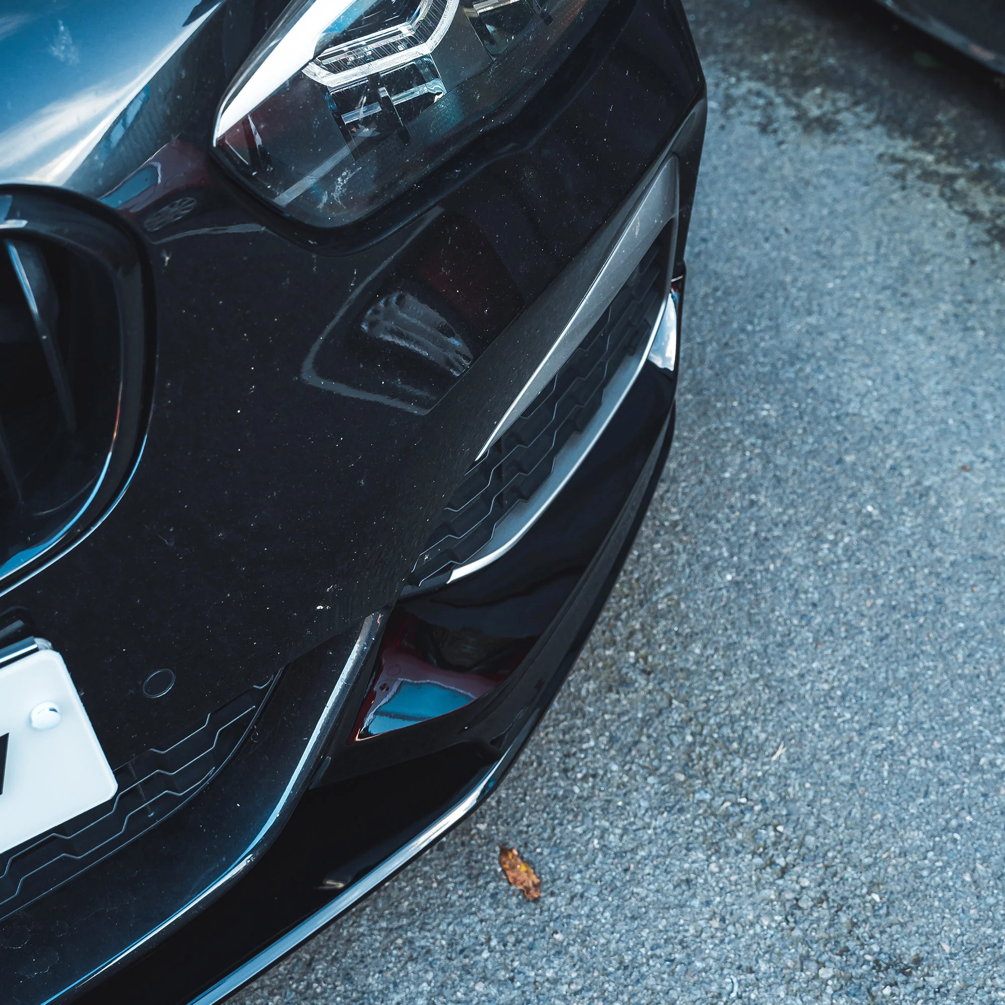 BMW F20/F21 1 SERIES LCI GLOSS BLACK SPLITTER-Splitter-BLAK BY CT-CT Carbon - High-quality carbon fiber and gloss black aerodynamic parts for premium sports and luxury vehicles.