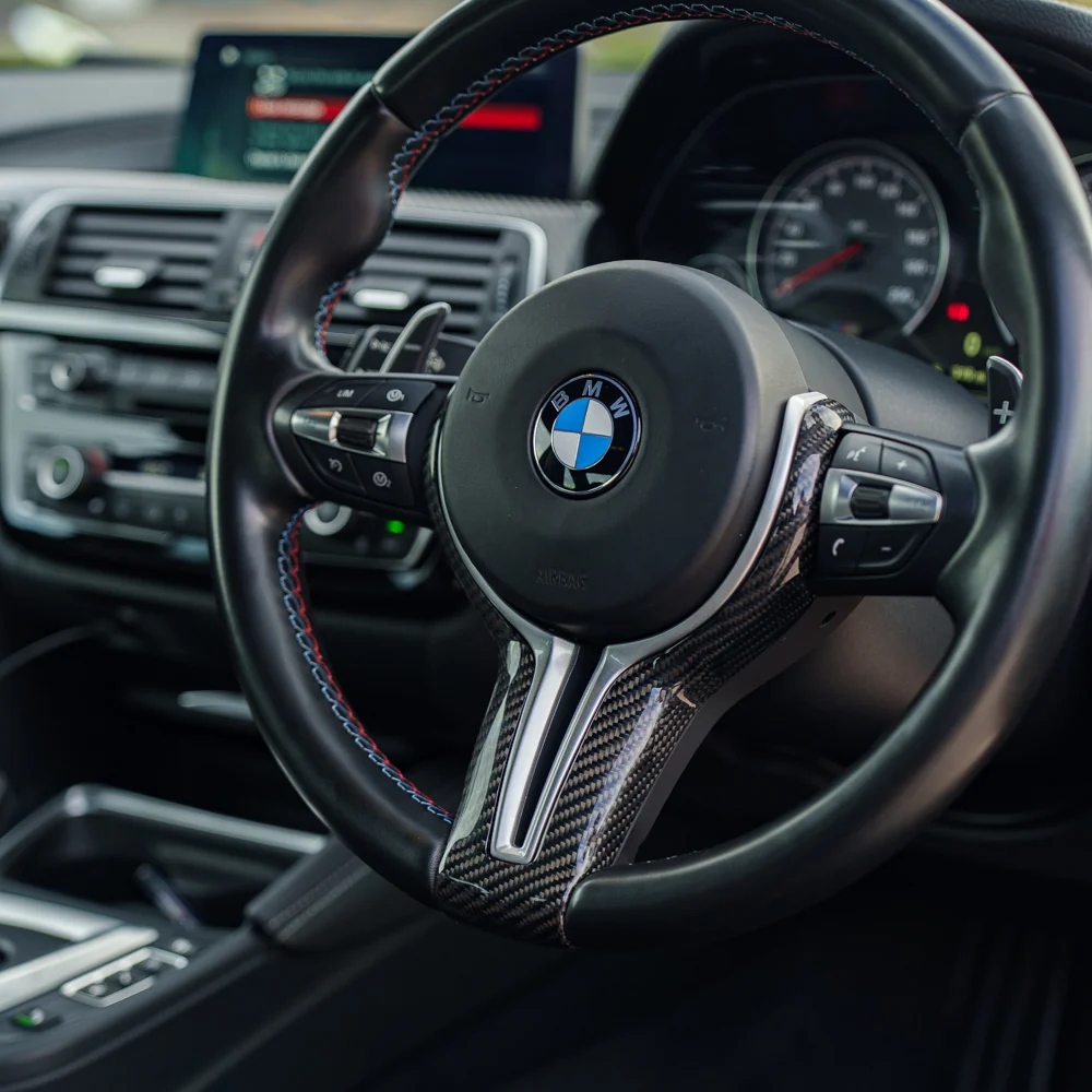 BMW Fxx M CAR CARBON FIBRE STEERING WHEEL TRIM-Accessories-CT CARBON-CT Carbon - High-quality carbon fiber and gloss black aerodynamic parts for premium sports and luxury vehicles.