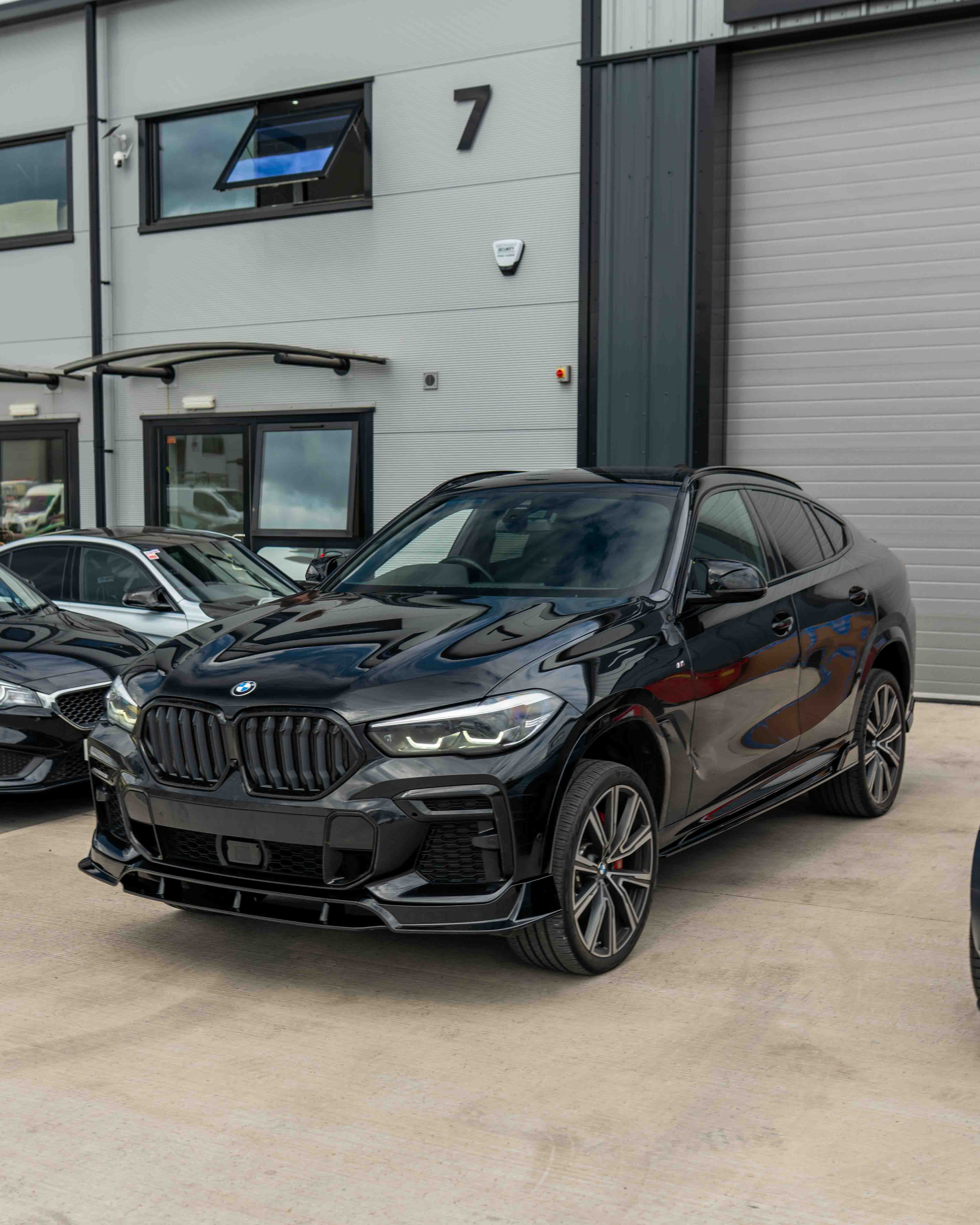BMW G06 X6 PRE-LCI FULL GLOSS BLACK KIT-Kit-BLAK BY CT-CT Carbon - High-quality carbon fiber and gloss black aerodynamic parts for premium sports and luxury vehicles.