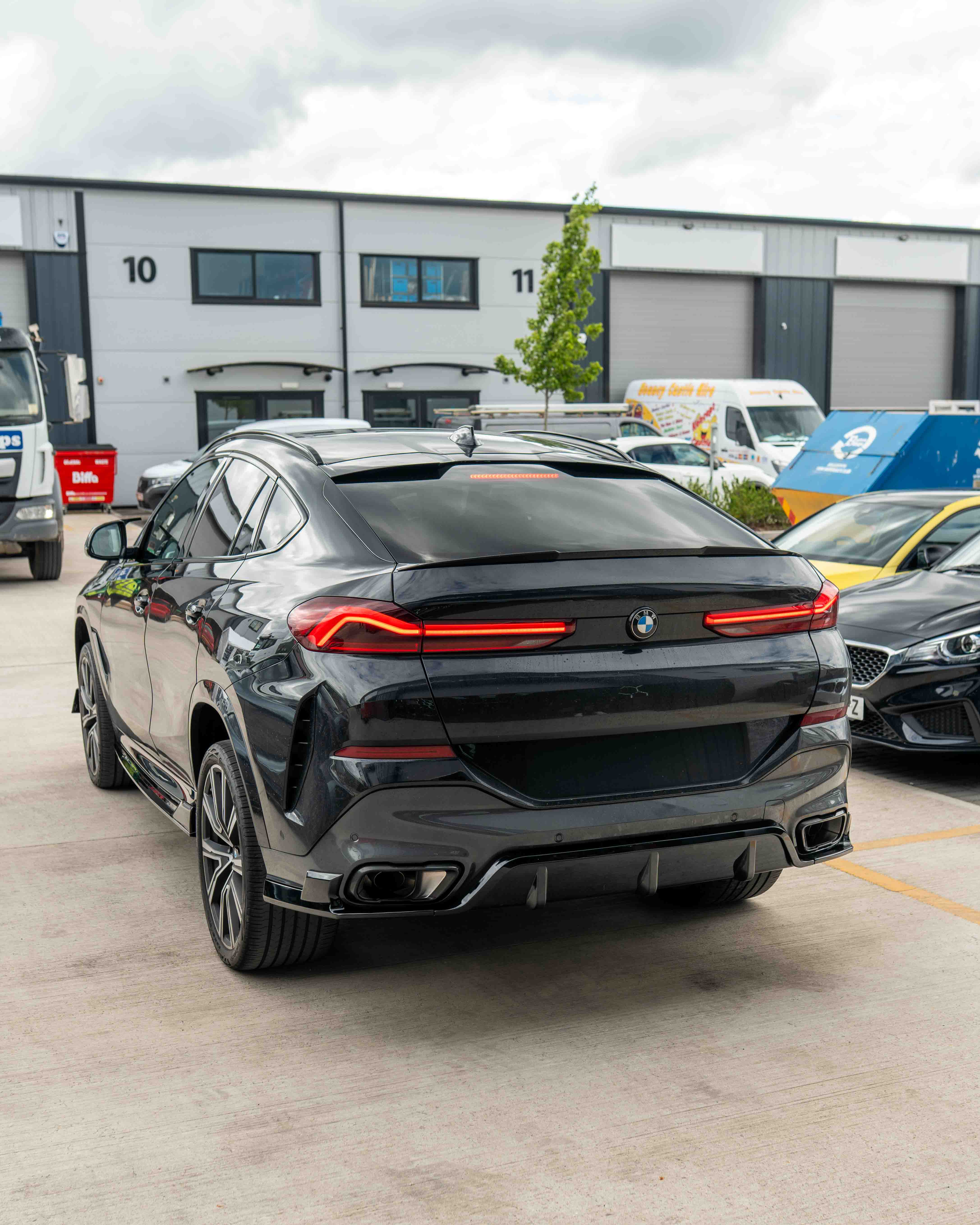 BMW G06 X6 PRE-LCI FULL GLOSS BLACK KIT-Kit-BLAK BY CT-CT Carbon - High-quality carbon fiber and gloss black aerodynamic parts for premium sports and luxury vehicles.