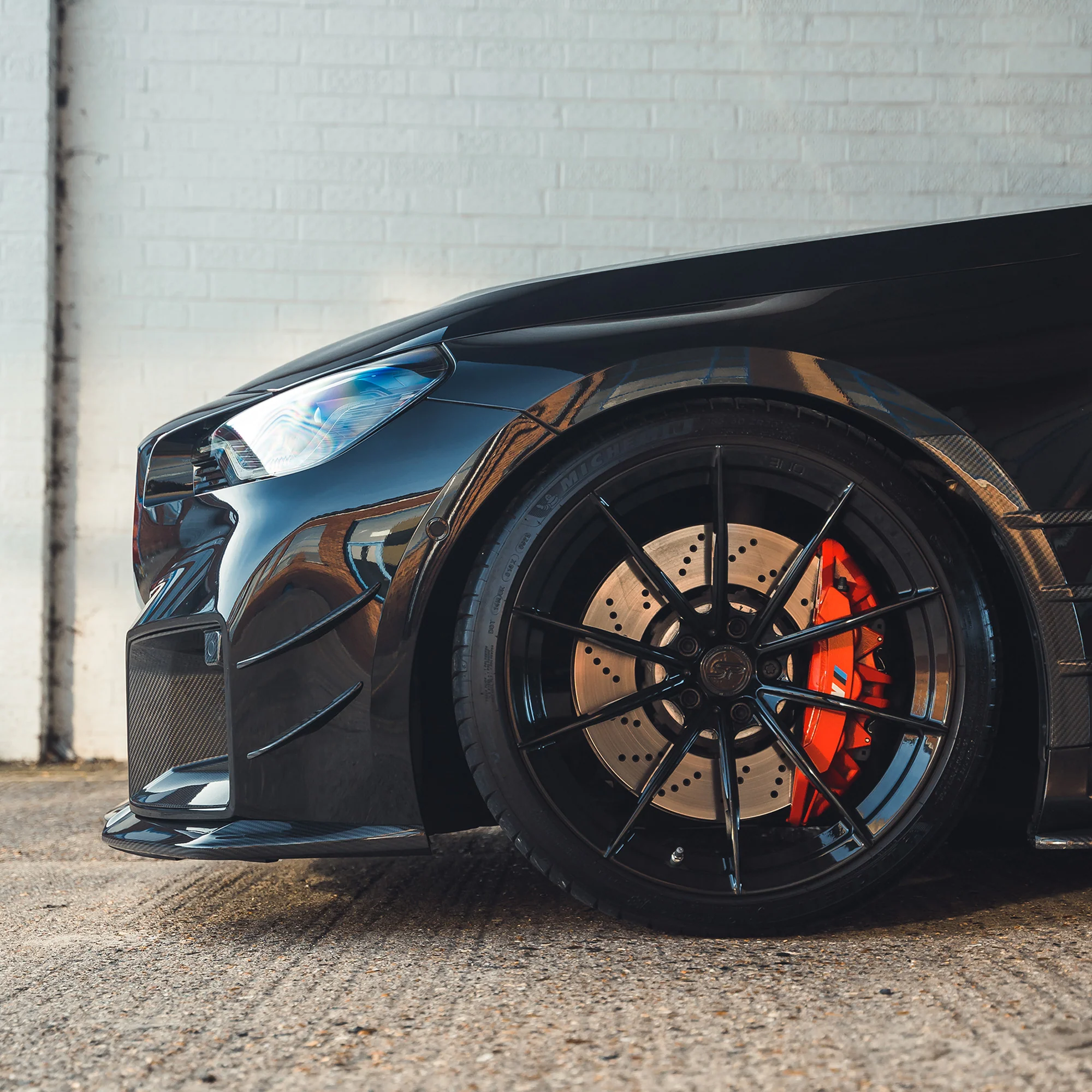 BMW G87 M2 CARBON FIBRE FRONT BUMPER CANARDS-Accessories-CT CARBON-CT Carbon - High-quality carbon fiber and gloss black aerodynamic parts for premium sports and luxury vehicles.