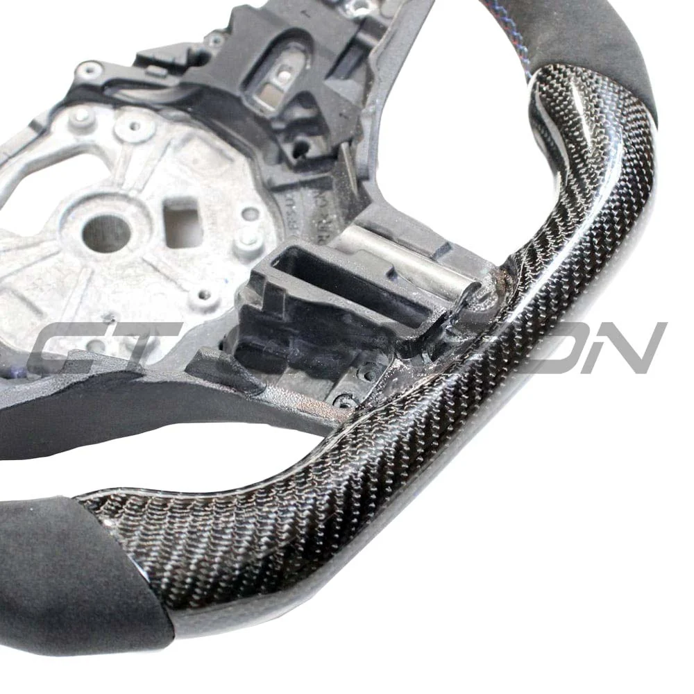 BMW Gxx 5,8,X3,X4,X5,X6,X7,M5,M8,X3M,X4M,X5M,X6M,X7M CARBON FIBRE / ALCANTARA FLAT BOTTOM STEERING WHEEL WITH HEATING