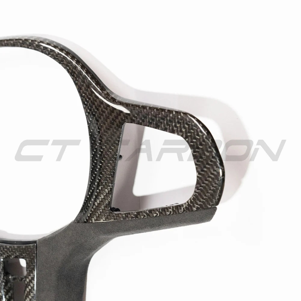 BMW Gxx M CAR CARBON FIBRE STEERING WHEEL TRIM - HEATING-Accessories-CT CARBON-CT Carbon - High-quality carbon fiber and gloss black aerodynamic parts for premium sports and luxury vehicles.