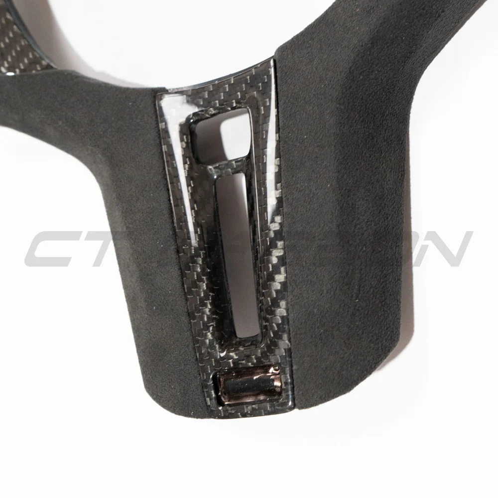 BMW Gxx M CAR CARBON FIBRE STEERING WHEEL TRIM - HEATING-Accessories-CT CARBON-CT Carbon - High-quality carbon fiber and gloss black aerodynamic parts for premium sports and luxury vehicles.