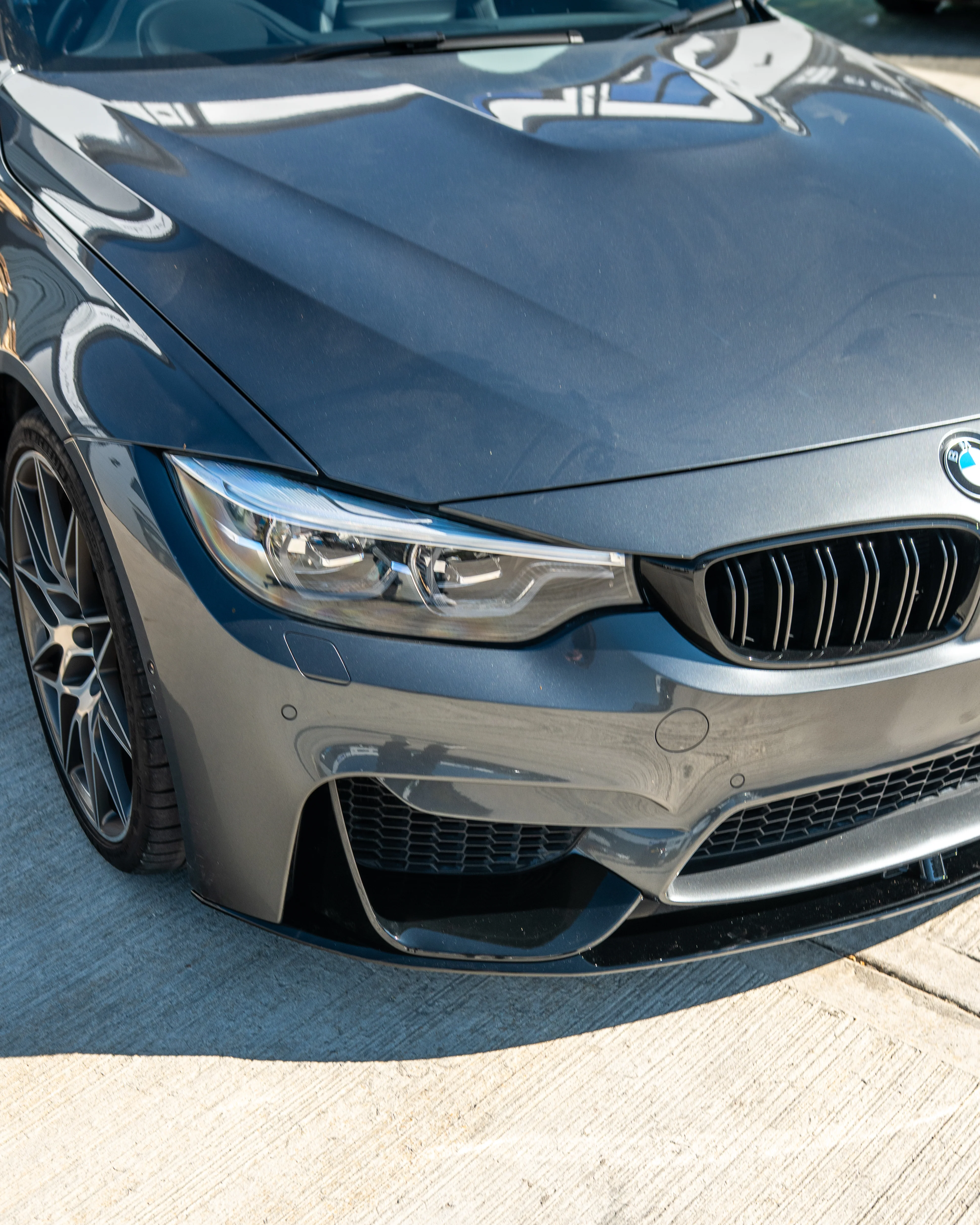 BMW M3/M4 (F80 F82 F83) GLOSS BLACK SPLITTER - MP STYLE-Splitter-BLAK BY CT-CT Carbon - High-quality carbon fiber and gloss black aerodynamic parts for premium sports and luxury vehicles.