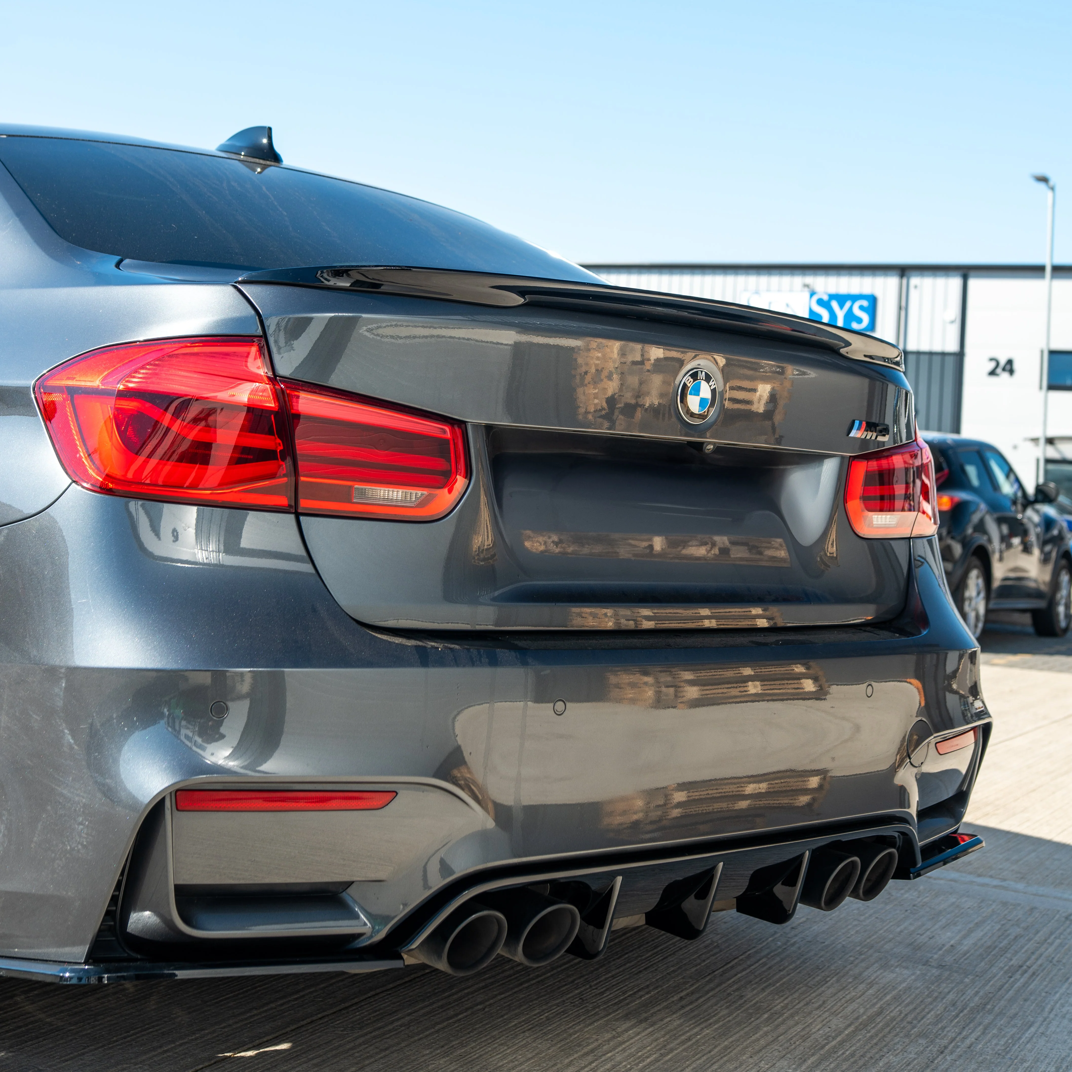 BMW M3/M4 (F80 F82 F83) GLOSS BLACK DIFFUSER - V STYLE-Diffuser-BLAK BY CT-CT Carbon - High-quality carbon fiber and gloss black aerodynamic parts for premium sports and luxury vehicles.