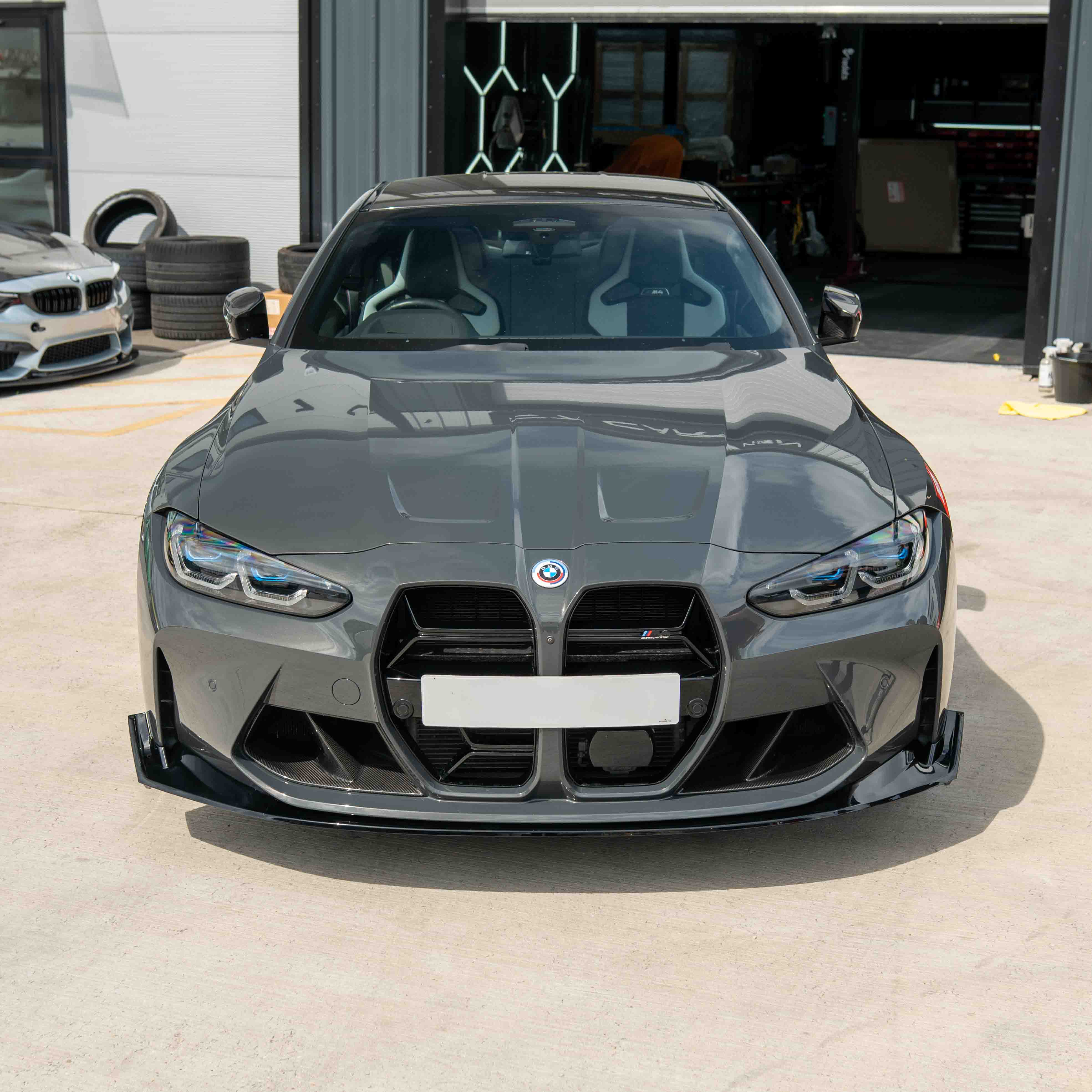 BMW M3 & M4 G80/G81/G82/G83 GLOSS BLACK SPLITTER - CSL STYLE-Splitter-BLAK BY CT-CT Carbon - High-quality carbon fiber and gloss black aerodynamic parts for premium sports and luxury vehicles.