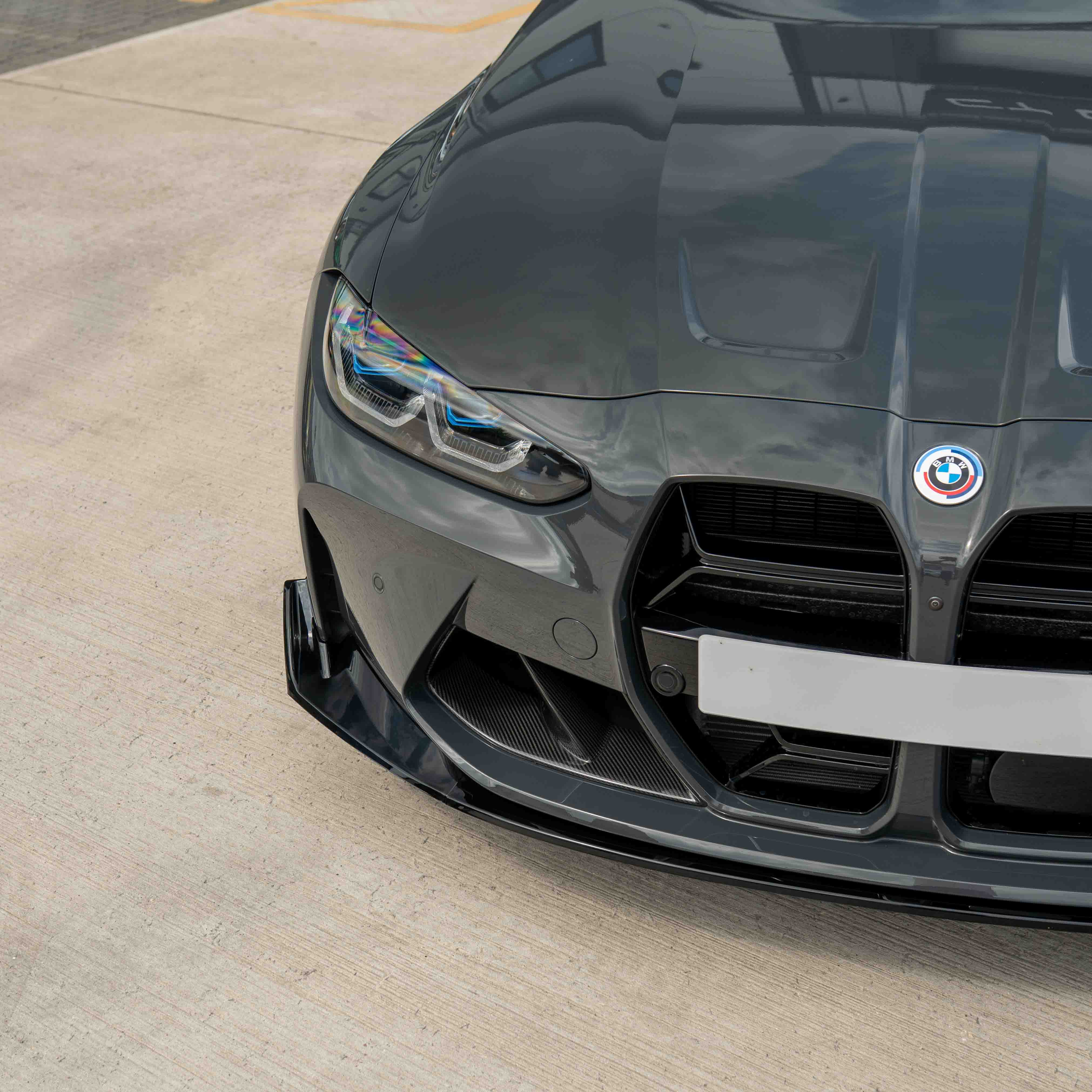 BMW M3 & M4 G80/G81/G82/G83 GLOSS BLACK SPLITTER - CSL STYLE-Splitter-BLAK BY CT-CT Carbon - High-quality carbon fiber and gloss black aerodynamic parts for premium sports and luxury vehicles.