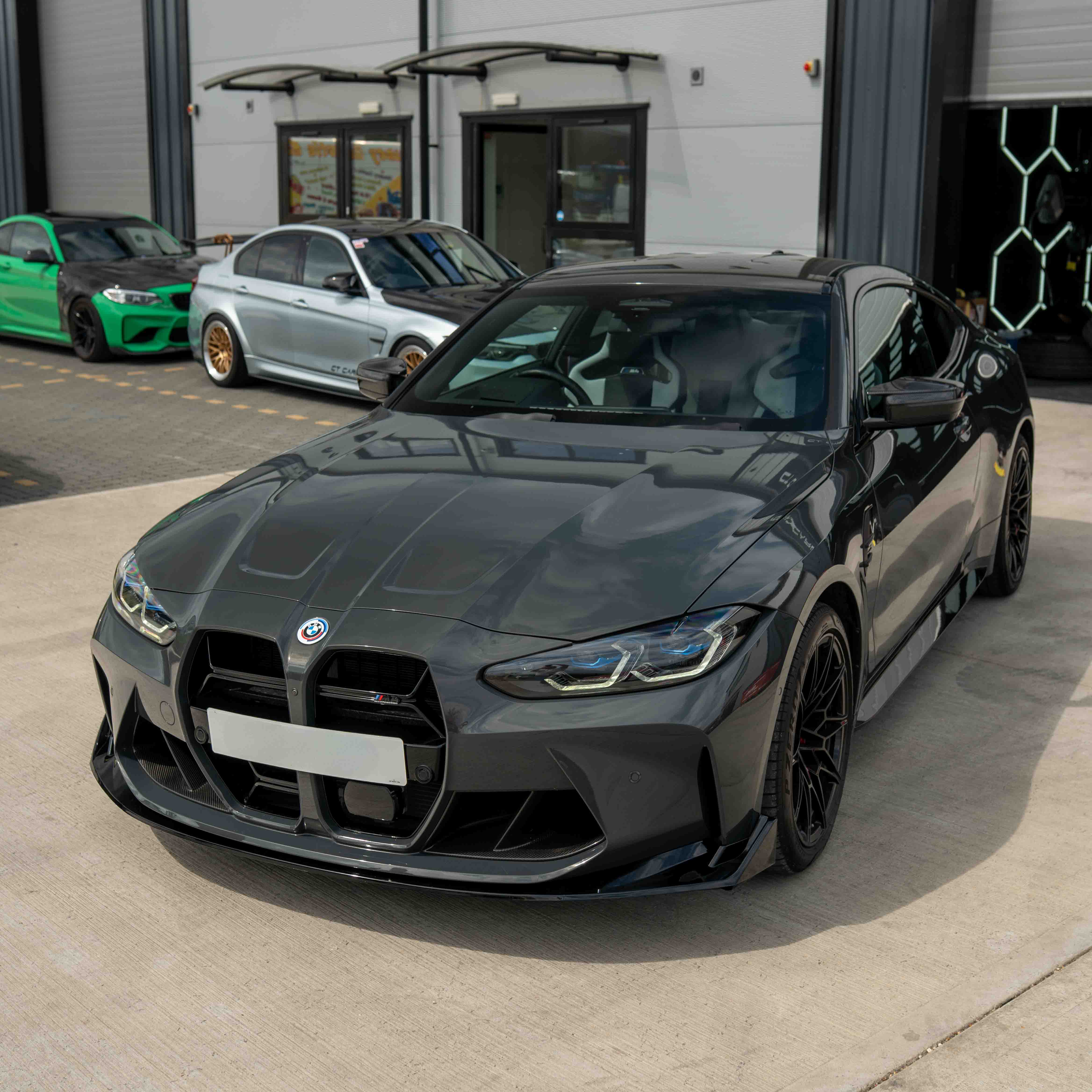 BMW M3 & M4 G80/G81/G82/G83 GLOSS BLACK SPLITTER - CSL STYLE-Splitter-BLAK BY CT-CT Carbon - High-quality carbon fiber and gloss black aerodynamic parts for premium sports and luxury vehicles.