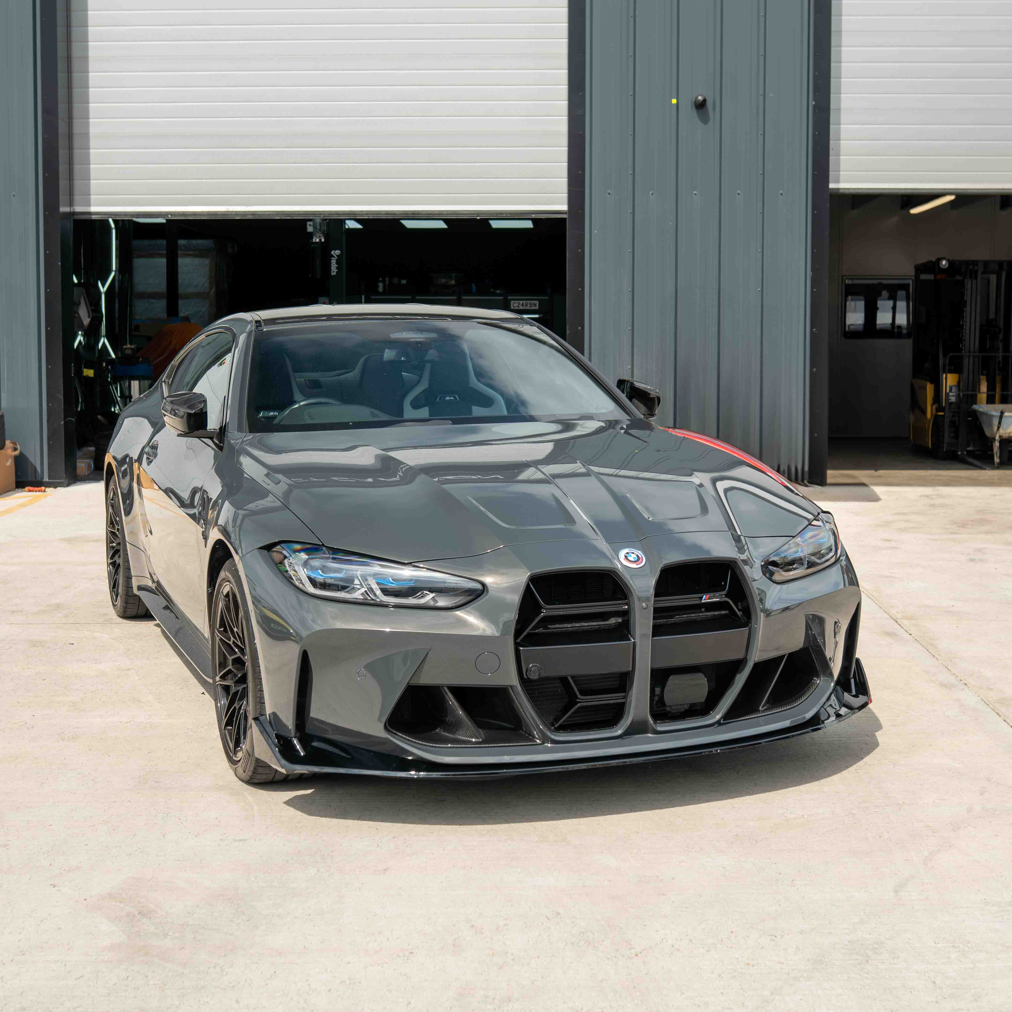 BMW M3 & M4 G80/G81/G82/G83 GLOSS BLACK SPLITTER - CSL STYLE-Splitter-BLAK BY CT-CT Carbon - High-quality carbon fiber and gloss black aerodynamic parts for premium sports and luxury vehicles.