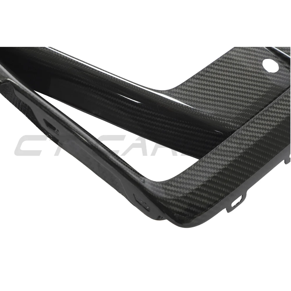 BMW X3M/X4M F97/F98 LCI 2022+ CARBON FIBRE FRONT BUMPER TRIM-Accessories-CT CARBON-CT Carbon - High-quality carbon fiber and gloss black aerodynamic parts for premium sports and luxury vehicles.