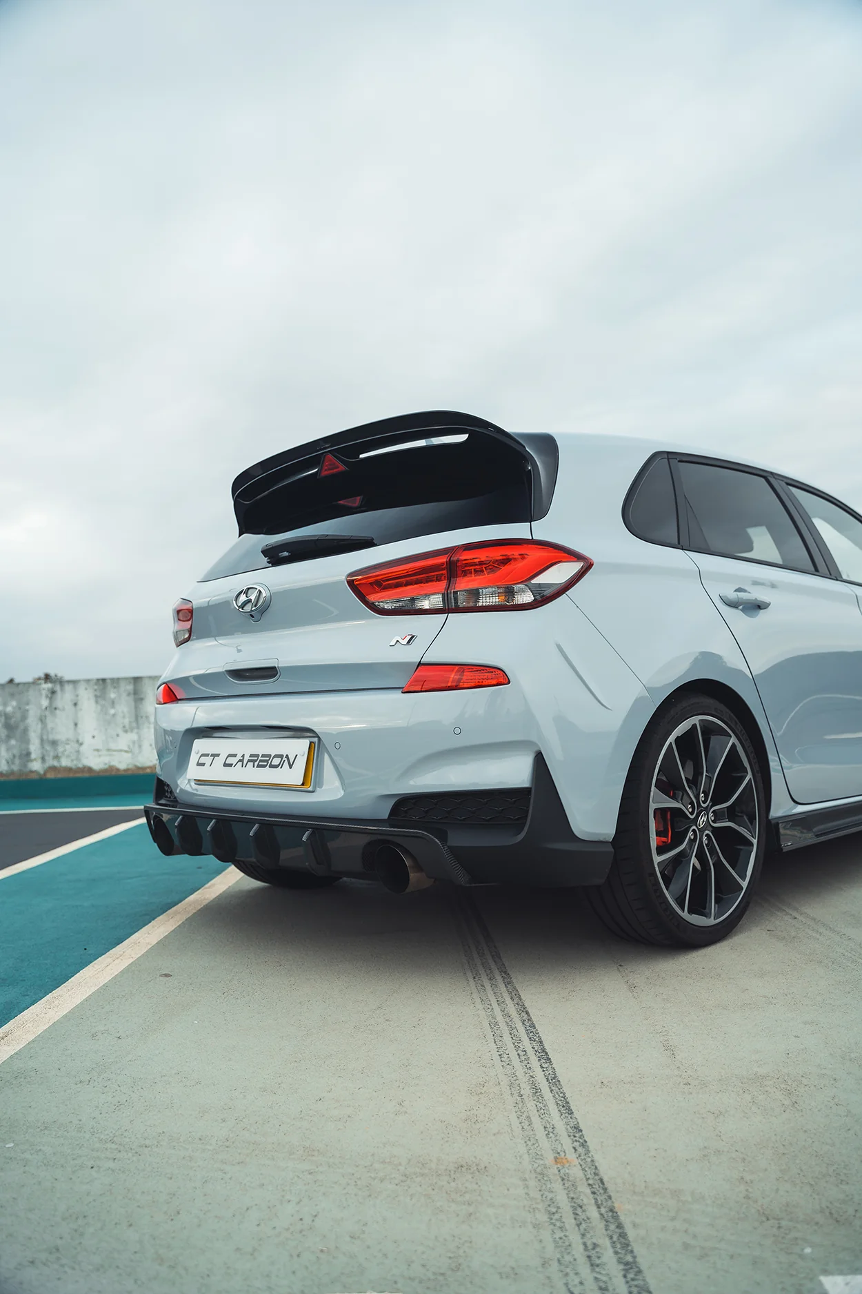HYUNDAI i30N CARBON FIBRE DIFFUSER (PRE-FACELIFT) - CT DESIGN-Splitter-CT CARBON-CT Carbon - High-quality carbon fiber and gloss black aerodynamic parts for premium sports and luxury vehicles.