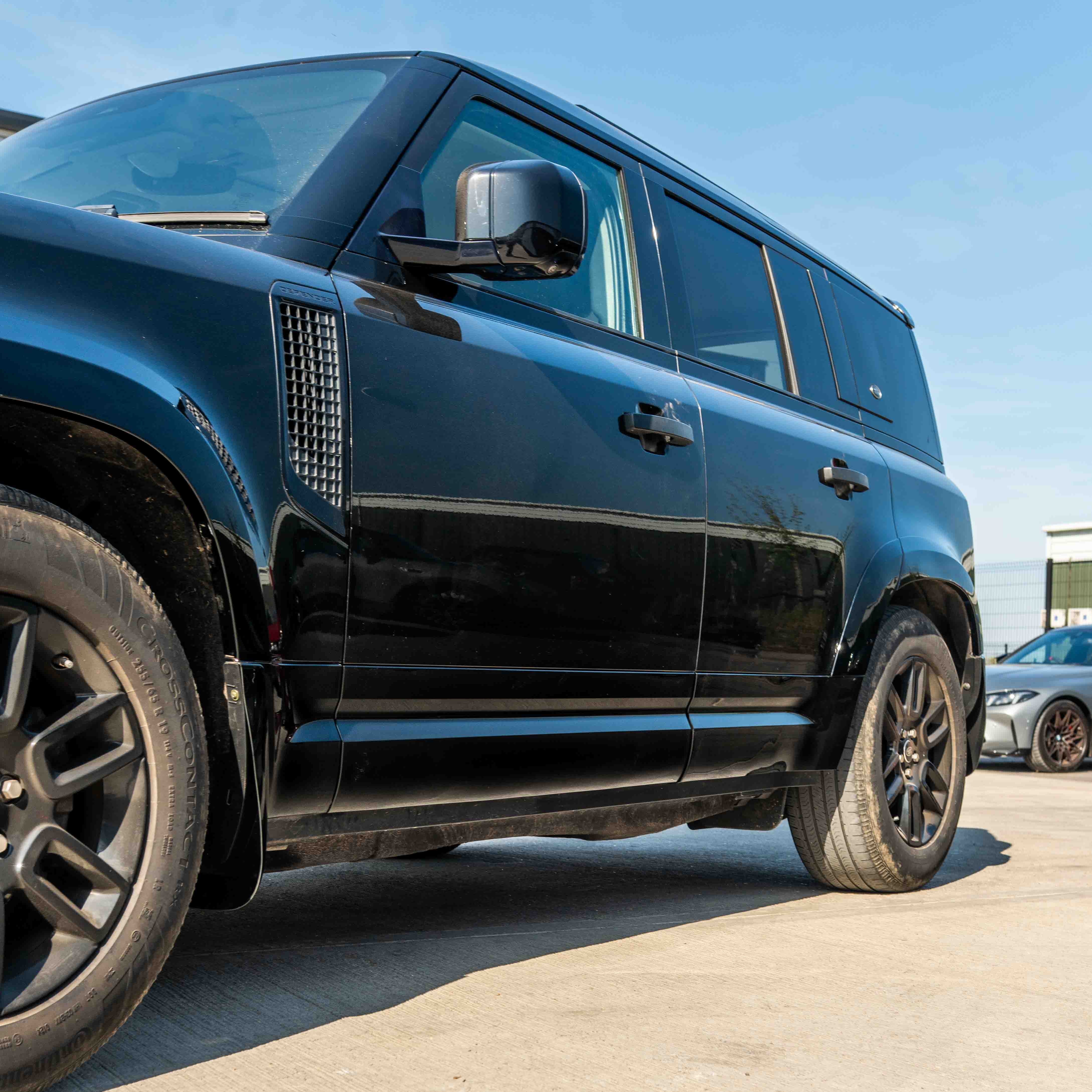 LAND ROVER DEFENDER L663 110 & 90 FRONT AND REAR GLOSS BLACK MIDDLE TRIM PACK-Kit-BLAK BY CT-CT Carbon - High-quality carbon fiber and gloss black aerodynamic parts for premium sports and luxury vehicles.