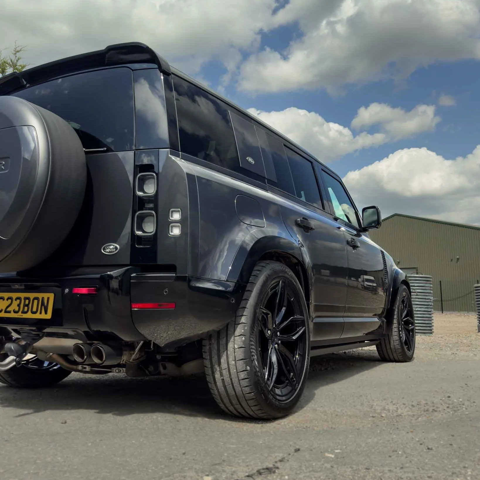 LAND ROVER DEFENDER L663 110 GLOSS BLACK WIDE ARCH FENDERS-Accessories-BLAK BY CT-CT Carbon - High-quality carbon fiber and gloss black aerodynamic parts for premium sports and luxury vehicles.