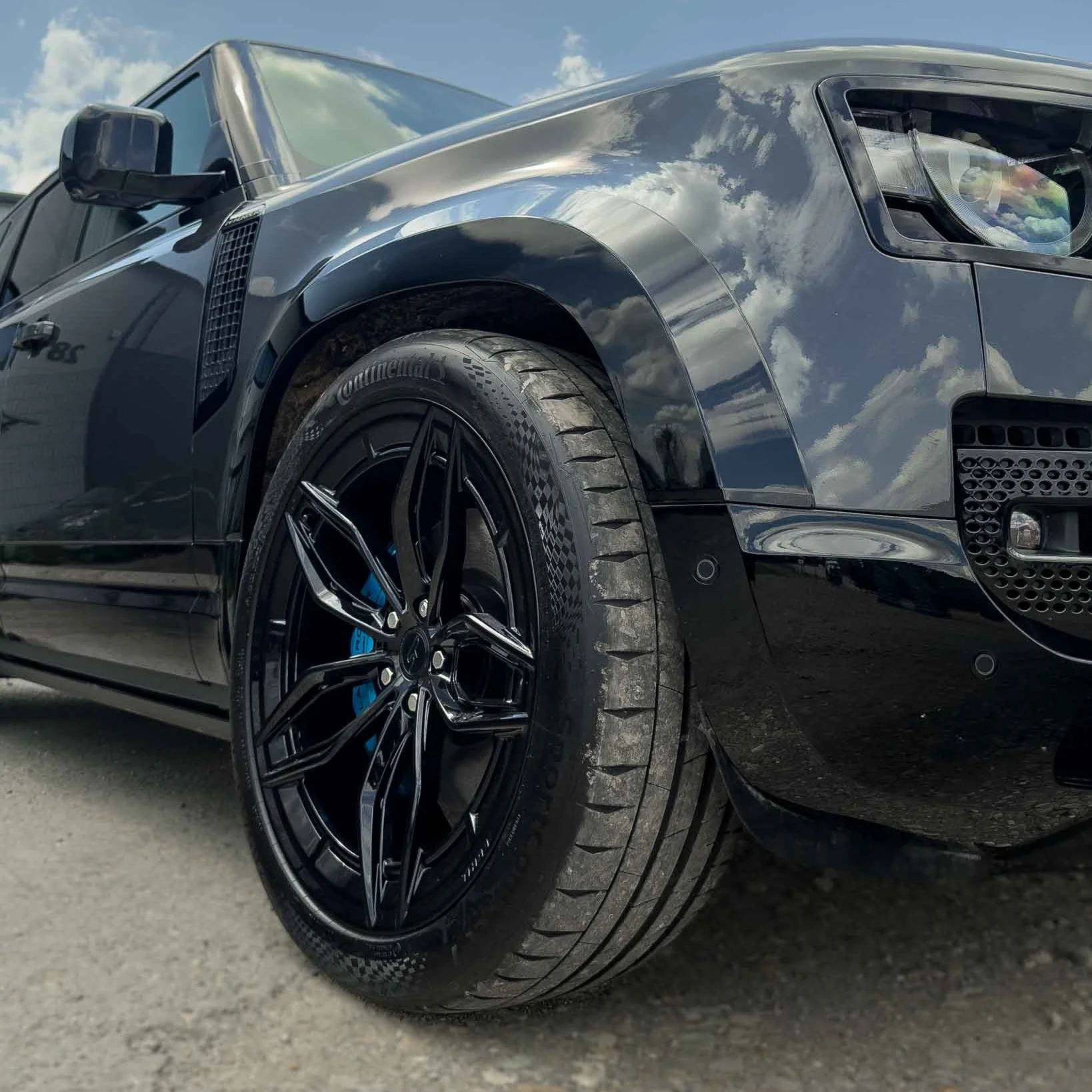 LAND ROVER DEFENDER L663 110 GLOSS BLACK WIDE ARCH FENDERS-Accessories-BLAK BY CT-CT Carbon - High-quality carbon fiber and gloss black aerodynamic parts for premium sports and luxury vehicles.