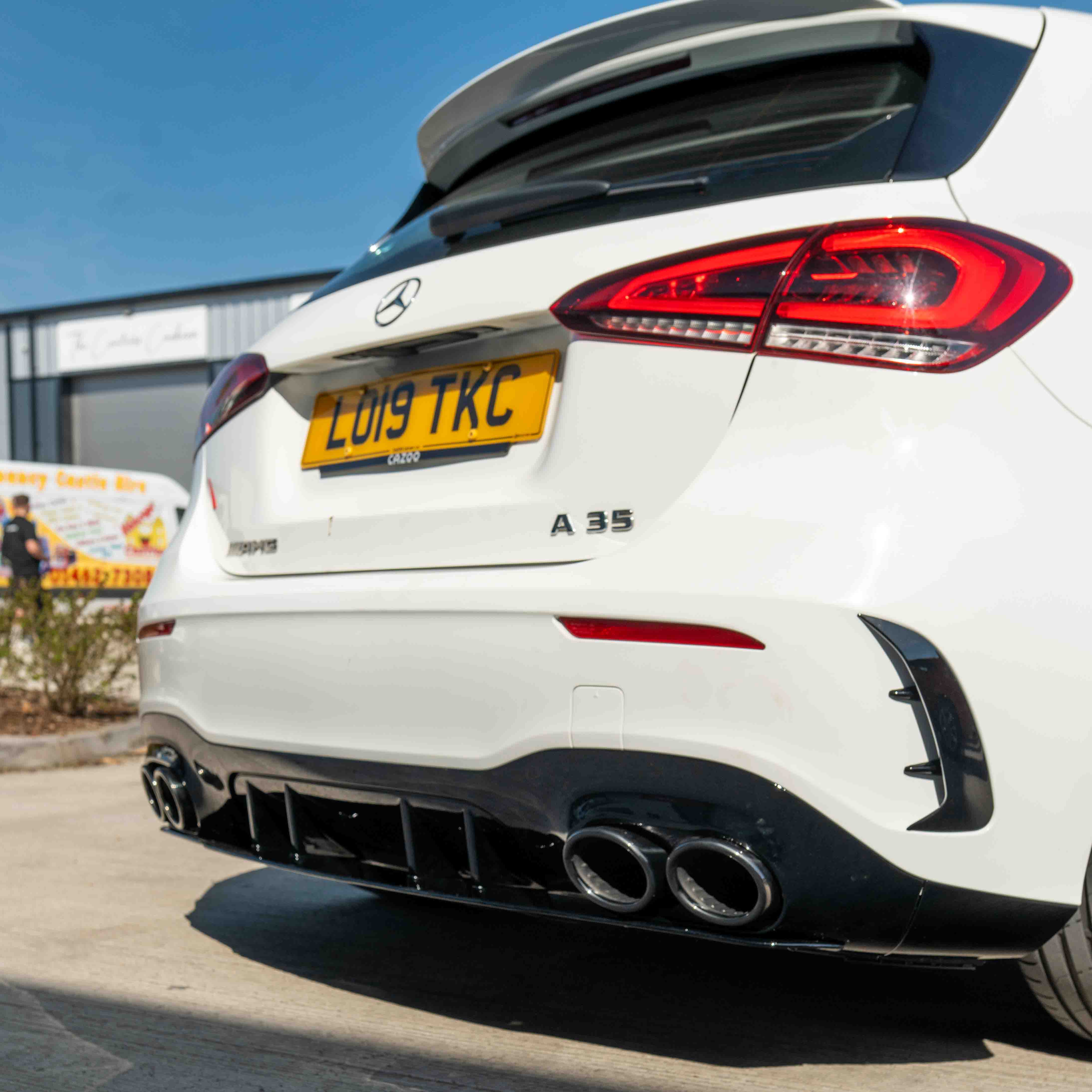 MERCEDES A-CLASS W177 2018-CURRENT GLOSS BLACK QUAD TIP DIFFUSER-Diffuser-BLAK BY CT-CT Carbon - High-quality carbon fiber and gloss black aerodynamic parts for premium sports and luxury vehicles.