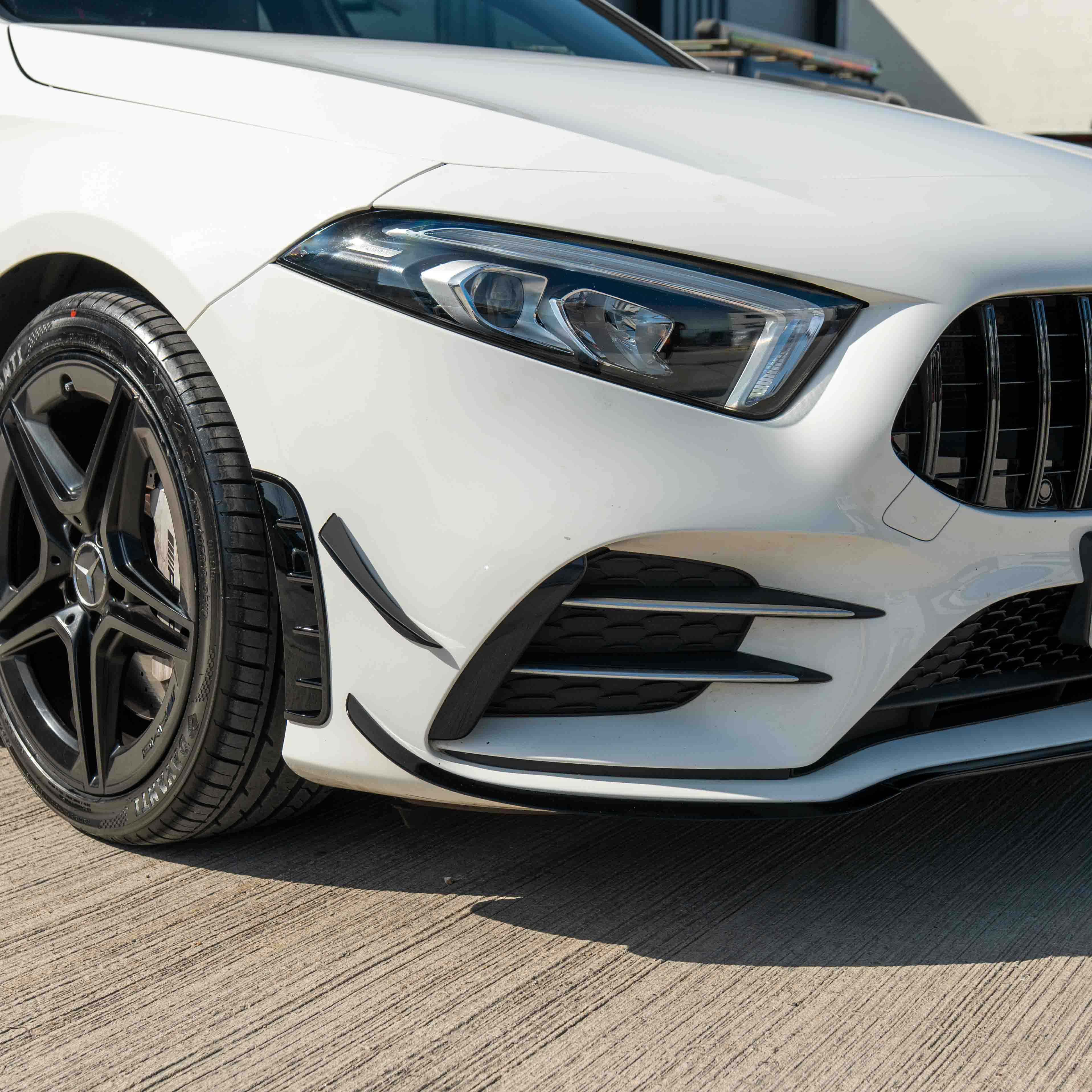 MERCEDES A-CLASS V177 & W177 2018-2022 GLOSS BLACK SPLITTER & CANARDS-Splitter-BLAK BY CT-CT Carbon - High-quality carbon fiber and gloss black aerodynamic parts for premium sports and luxury vehicles.