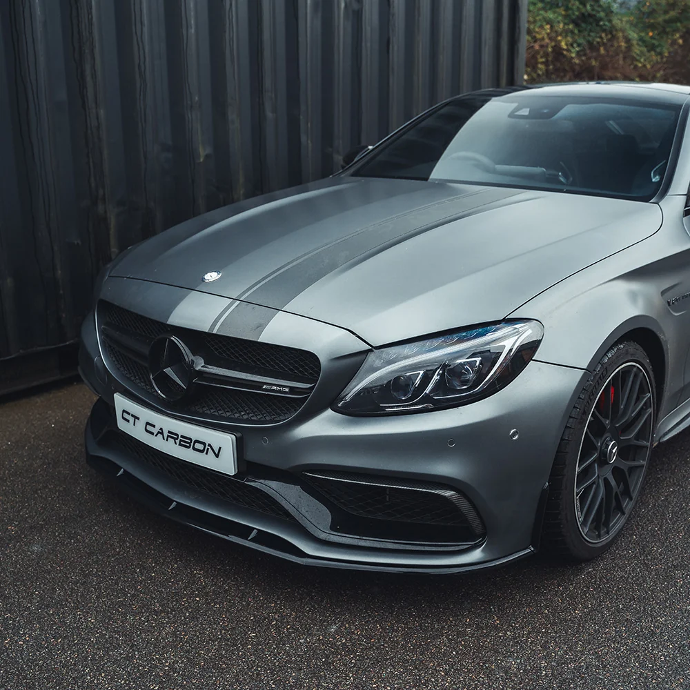 MERCEDES W205 C63 COUPE GLOSS BLACK SPLITTER-Splitter-BLAK BY CT-CT Carbon - High-quality carbon fiber and gloss black aerodynamic parts for premium sports and luxury vehicles.