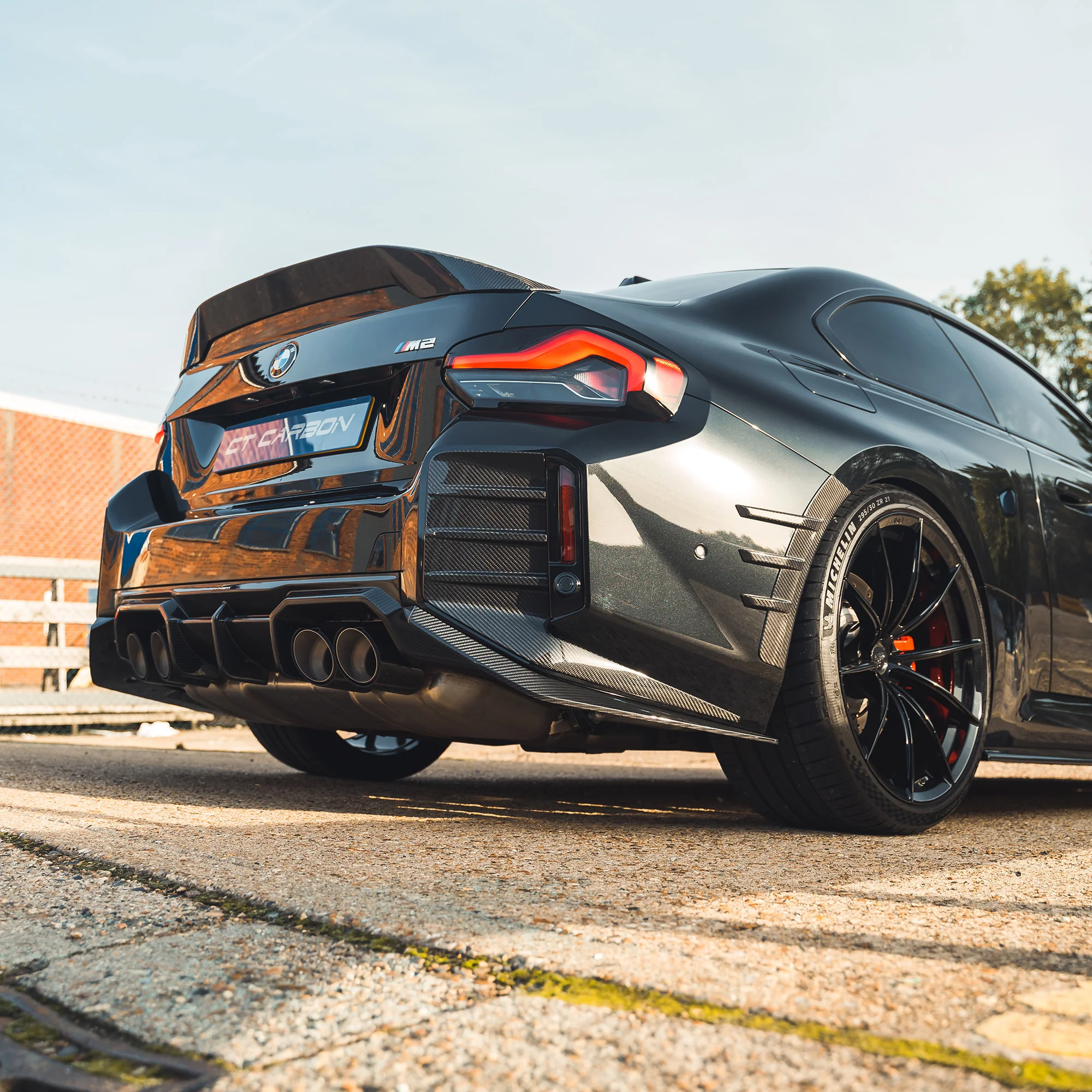 BMW G87 M2 CARBON FIBRE REAR BUMPER CORNERS - CT DESIGN-Accessories-CT CARBON-CT Carbon - High-quality carbon fiber and gloss black aerodynamic parts for premium sports and luxury vehicles.