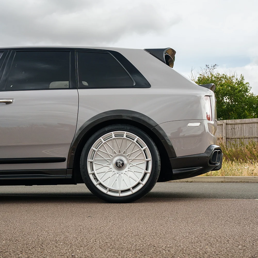 ROLLS ROYCE CULLINAN CARBON FIBRE WHEEL ARCH EXTENSIONS - CT DESIGN-Splitter-CT Carbon-CT Carbon - High-quality carbon fiber and gloss black aerodynamic parts for premium sports and luxury vehicles.