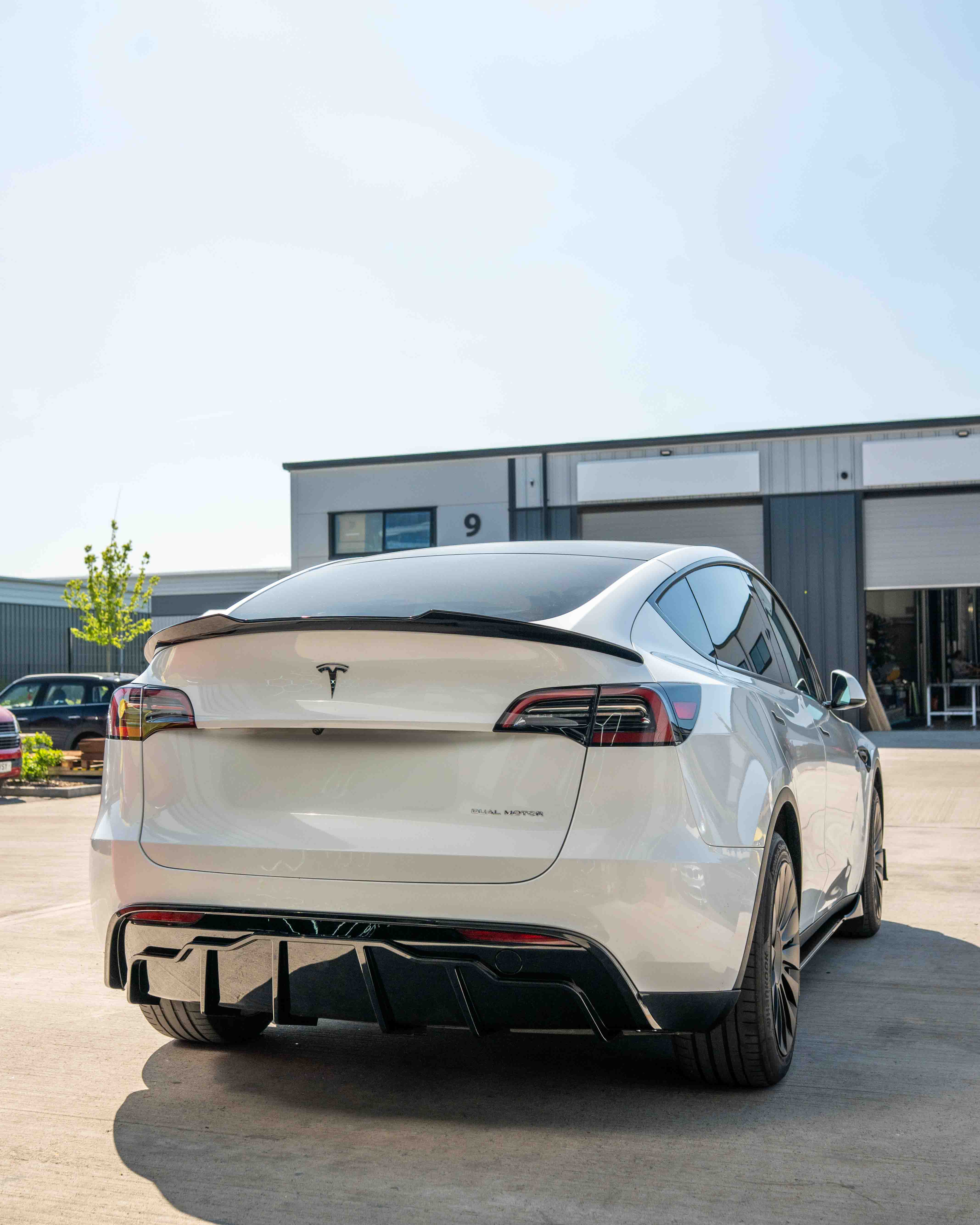 TESLA MODEL Y FULL GLOSS BLACK KIT - BLAK BY CT CARBON-Kit-BLAK BY CT-CT Carbon - High-quality carbon fiber and gloss black aerodynamic parts for premium sports and luxury vehicles.